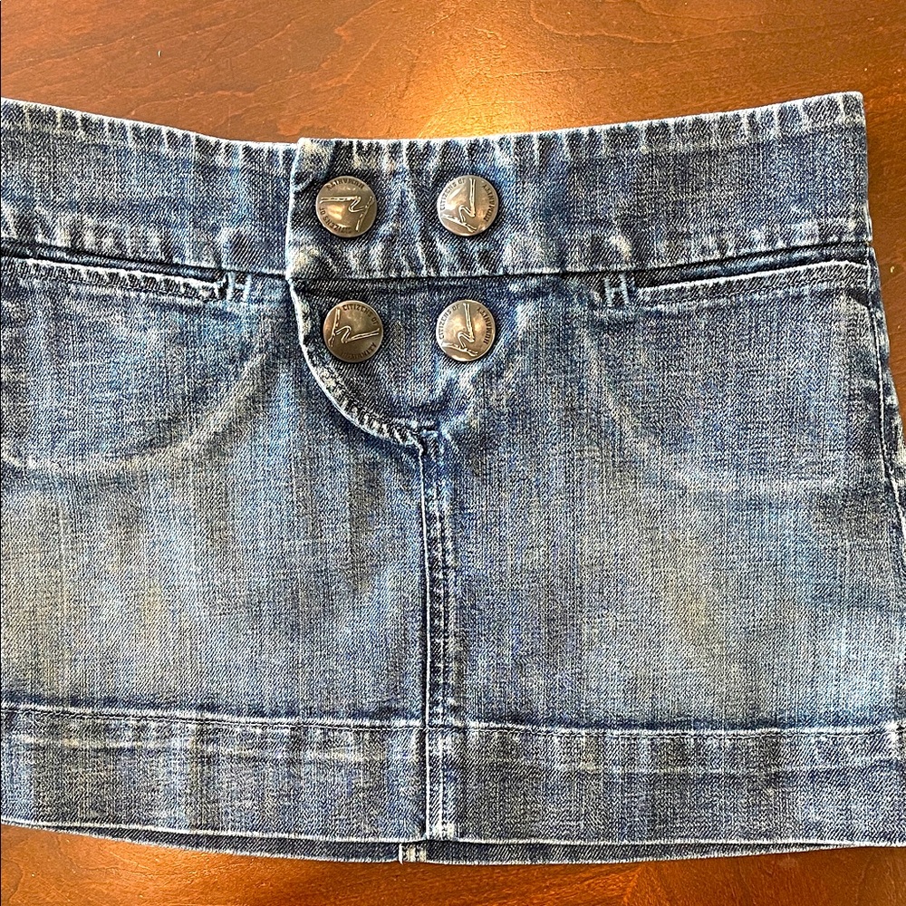 Citizens of Humanity Denim Mini Skirt. Snap logo buttons. 10” plus 2” waistband.